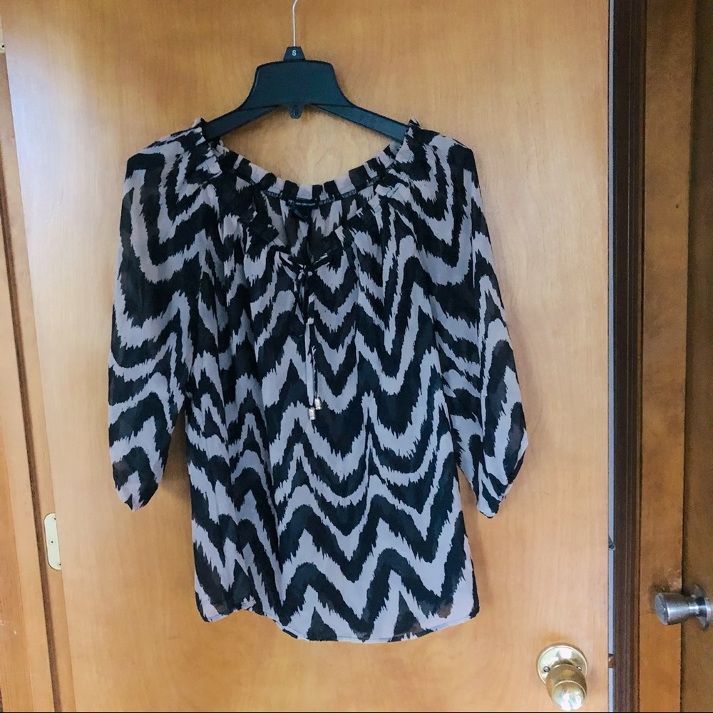 Sheer animal print blouse